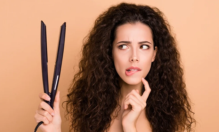 Avoid blow dryers, curling irons, and straighteners to prevent heat damage. Air-dry your hair and hydrate it for healthy, frizz-free summer hair.